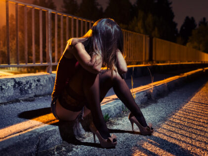 Desperate young woman on bridge