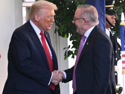 US President Donald Trump greets Australia's Prime Minister Anthony Albanese at the W