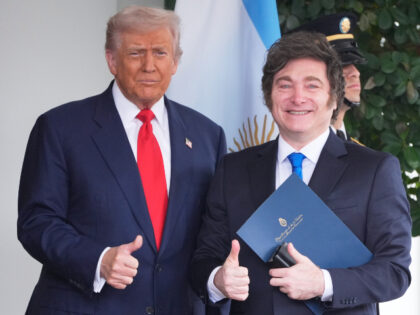 President Donald Trump greets Argentina's President Javier Milei, as he arrives at th