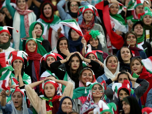TEHRAN, IRAN - OCTOBER 10: Iranian Women's fans react during the FIFA World Cup Qualifier