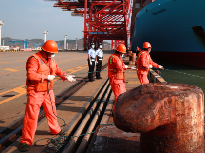 ZHOUSHAN, CHINA - AUGUST 21: The container ship Emma Mærsk is docked at the Dapukou conta