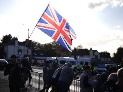 Protesters outside the Bell Hotel in Epping, Essex after a temporary injunction that would