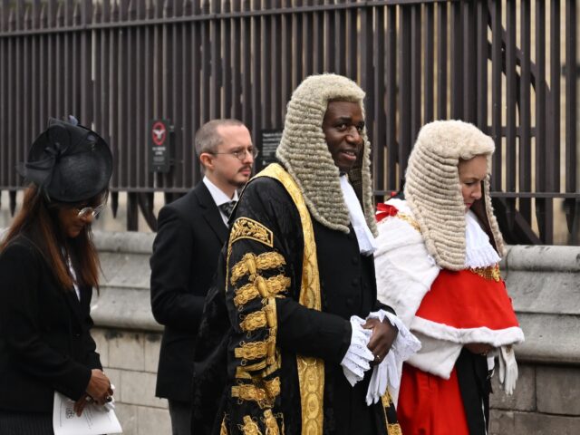 Britain's recently appointed Justice Secretary, and deputy Prime Minister, David Lammy (2R