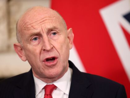 John Healey, UK defence minister, as he signs a defence treaty Tore O. Sandvik, Norway's d