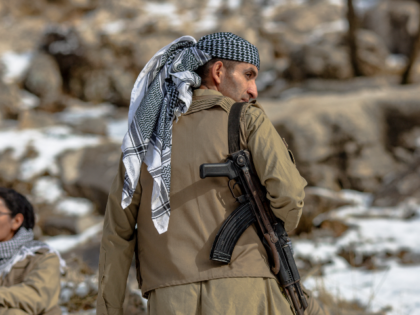 Members of the Kurdistan Democratic Party of Iran (KDPI) participate in a military drill i