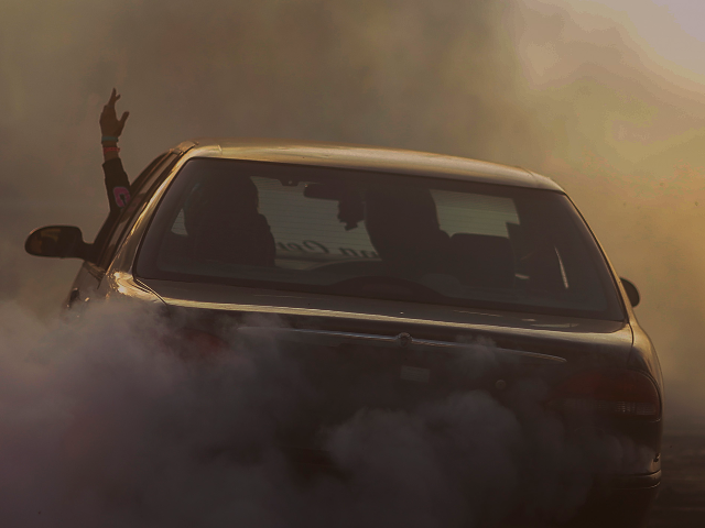 KANDOS, AUSTRALIA - JANUARY 25: A car performs a burnout during the Kandos Street Machine