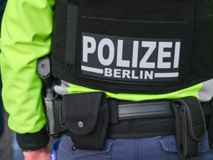 23 February 2026, Berlin: Police officers from the Berlin Police Academy carry out a traff