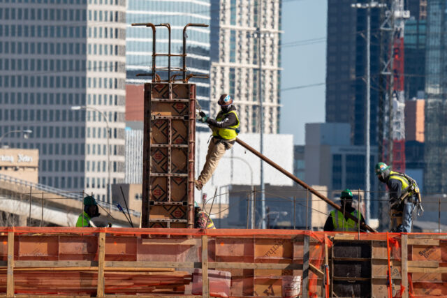 Workers at the Riverfront Development project along the Trinity River in Dallas, Texas, US
