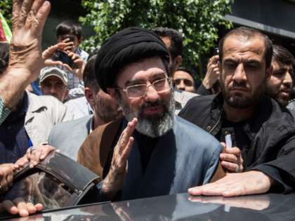 Mojtaba Khamenei (C), the son of the Iranian Supreme Leader Ayatollah Ali Khamenei, partic