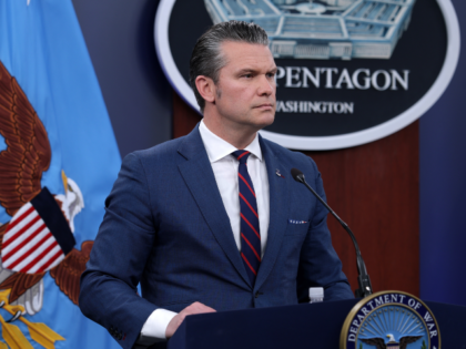ARLINGTON, VIRGINIA - MARCH 02: U.S. Secretary of War Pete Hegseth listens to question dur