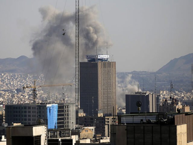 TEHRAN, IRAN - MARCH 06: Smoke rises after a series of powerful explosions occurred in the