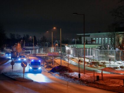 TOPSHOT - Large police resources are in place at the US embassy on Sunday night after a lo