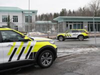 Police cars stand in front of the US Embassy in Oslo, Norway, on March 8, 2026, hours afte