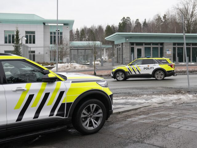 Police cars stand in front of the US Embassy in Oslo, Norway, on March 8, 2026, hours afte