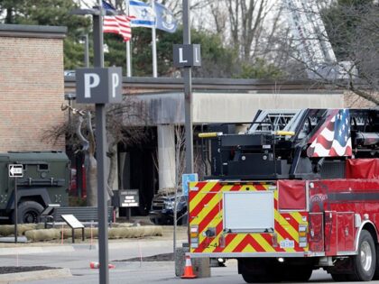 Law enforcement remain on site at the Temple Israel synagogue in West Bloomfield, Michigan
