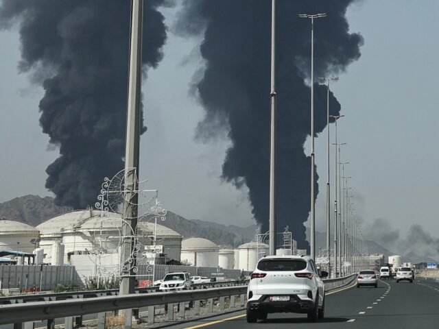 Smoke rises from the direction of an energy installation in the Gulf emirate of Fujairah o