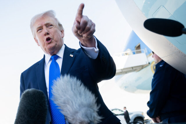 US-POLITICS-TRUMP US President Donald Trump speaks to reporters before boarding Air Force One at Palm Beach