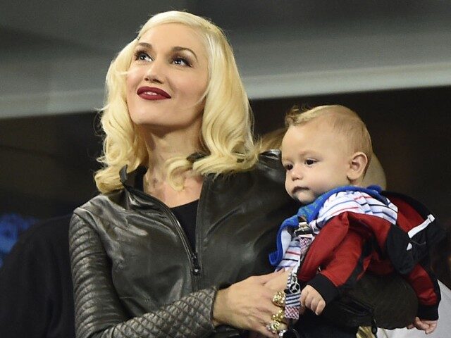 Gwen Stefani and Apollo Bowie Rossdale attend day 11 of the 2014 US Open at USTA Billie Je