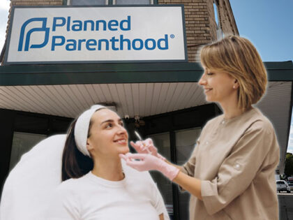 A sign hangs above the front door of a Planned Parenthood clinic on September 25, 2025 in