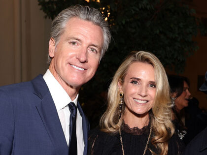 (L-R) Gavin Newsom, Jennifer Siebel Newsom, and Chance the Rapper attend Vogue World: Holl