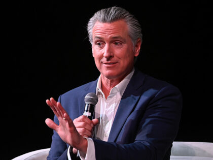 Potential Democratic presidential candidate and governor Gavin Newsom speaks with American