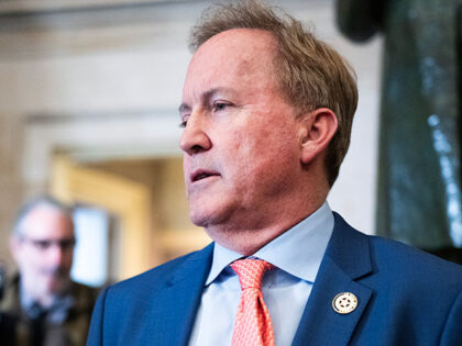 Texas Attorney General Ken Paxton talks with reporters in the U.S. Capitol's Statuary Hall