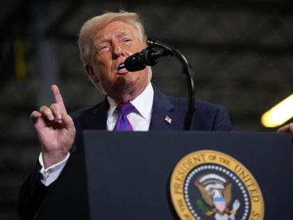 U.S. President Donald Trump speaks on stage at Verst Logistics on March 11, 2026 in Hebron