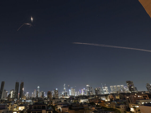 Iranian-missile-attacks-Tel-Aviv-Israel-Mar3-26-getty Rocket trails are seen in the sky amid a fresh barrage of Iranian missile attacks above th