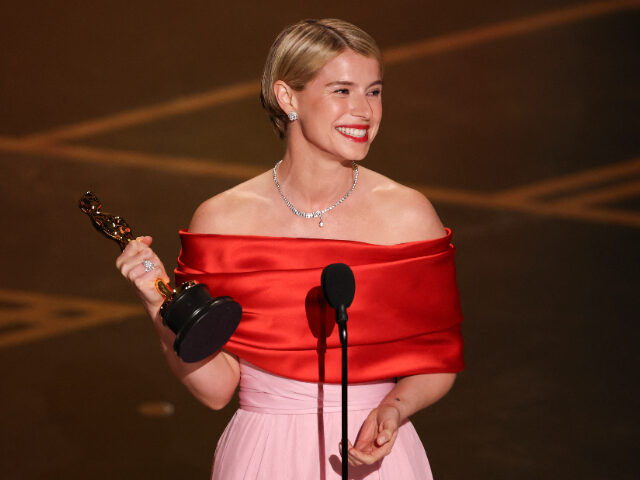 Irish actress Jessie Buckley accepts the award for Best Actress in a Leading Role for &quo