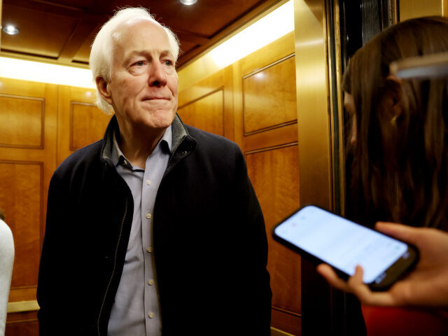 U.S. Sen. John Cornyn (R-TX) speaks to reporters as he arrives for a vote at the U.S. Capi