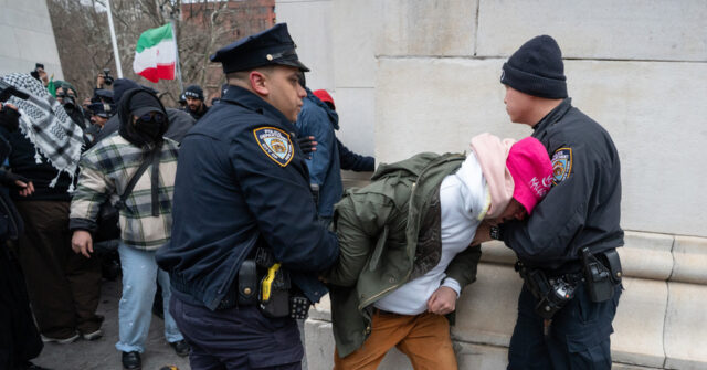 WATCH: Man Pummeled by Khamenei Mourners in NYC After Snatching Poster - Breitbart by Lowell Cauffiel