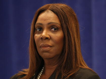 New York Attorney General Letitia James stands silently during a press conference at the o