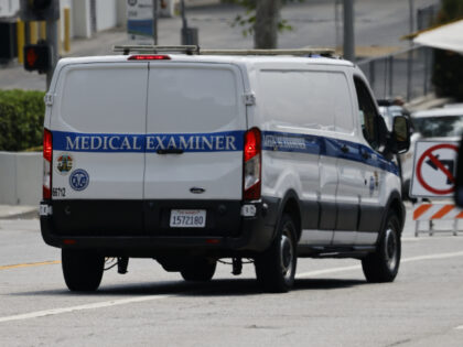 A Los Angles County medical examiner van drives on to the Biscailuz Center Academy Trainin