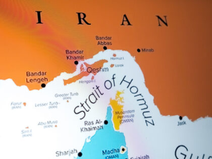 A map shows the Strait of Hormuz on a laptop computer screen in this photo illustration ta