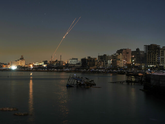 Israeli air defense system fires to intercept Iranian missiles over Israel, as seen from t