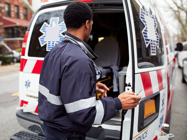 paramedic opening ambulance