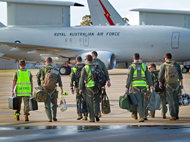 Air crew prepare to board the the E-7A Wedgetail Airborne Early Warning and Control aircra