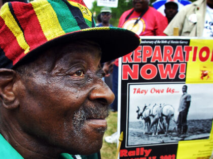 Borneti Phillipis, 76-years-old, from Wackegan, Illinois, joins hundreds of black demonstr