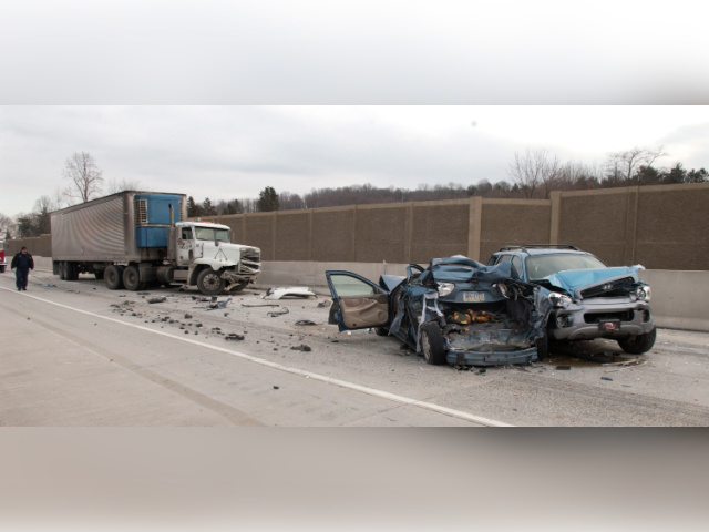 headline: Ohio Father, 11-Year-Old Son Killed by Alleged Mig