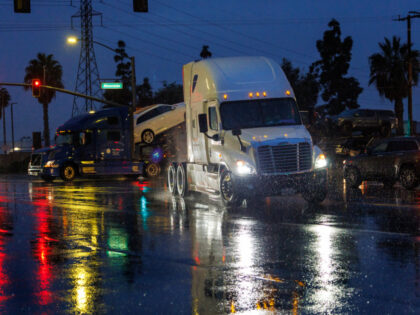 rucks turn onto Etiwanda Avenue, a route used heavily by trucks making their way to and fr