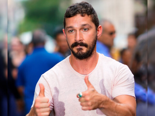 NEW YORK, NY - AUGUST 07: Shia LaBoeuf signs autographs for Radioman at AOL Build on Augus