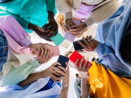 Teens using smartphones