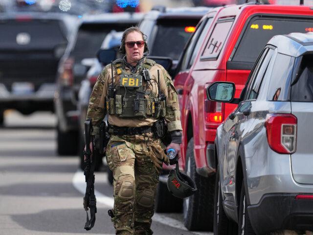 Law enforcement respond to a call at Temple Israel synagogue Thursday, March 12, 2026, in