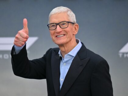 Tim Cook with a thumbs up for Apple ads