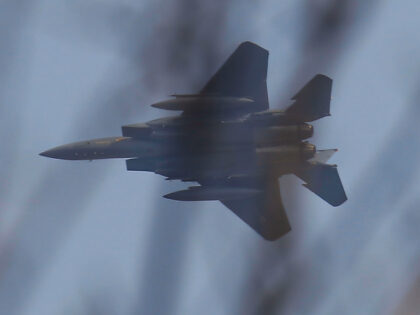USAF (United States Air Force) F-15E Strike fighter jet conducts flight training near the