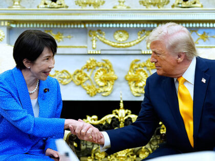 President Donald Trump greets Japan's Prime Minister Sanae Takaichi in the Oval Office of