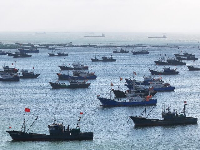 Fishing boats berth at a port at Zhifu Bay Area of Yantai Port in east China's Shangd
