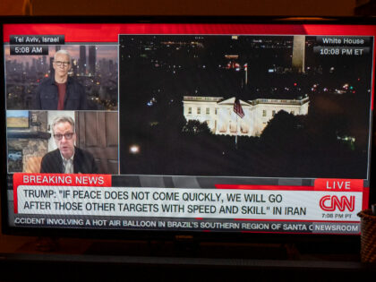 NEW YORK, NY - JUNE 21: CNN television reporter Anderson Cooper, top left, and CNN analyst