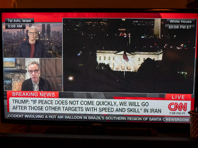 NEW YORK, NY - JUNE 21: CNN television reporter Anderson Cooper, top left, and CNN analyst