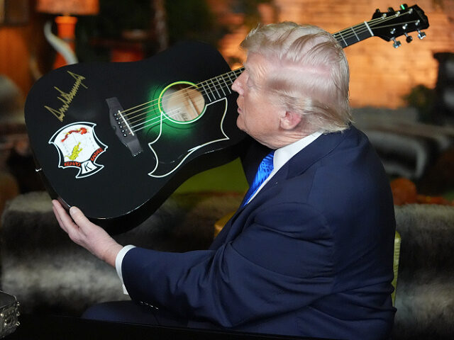 Trump Visits Graceland and Signs Replica Guitar: ‘I Love Elvis’